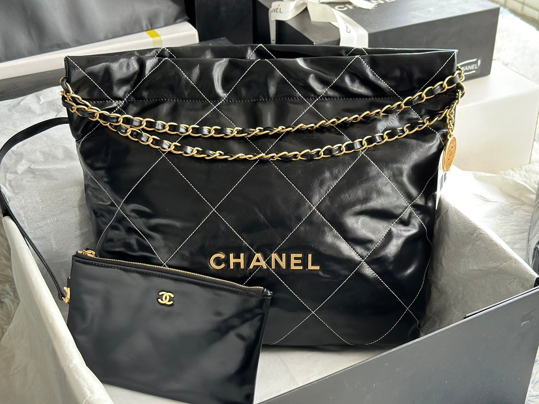 CHANEL LARGE 42 HANDBAG IN BLACK SHINY CALFSKIN GOLD HARDWARE