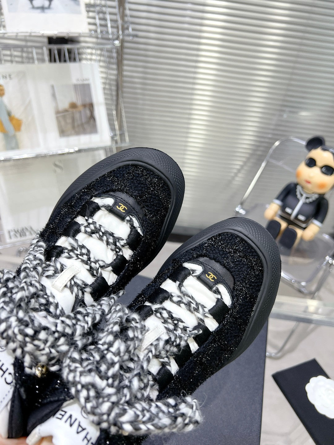 CHANEL CANO ALTO SNEAKER IN BLACK TWEED AND RUBBER