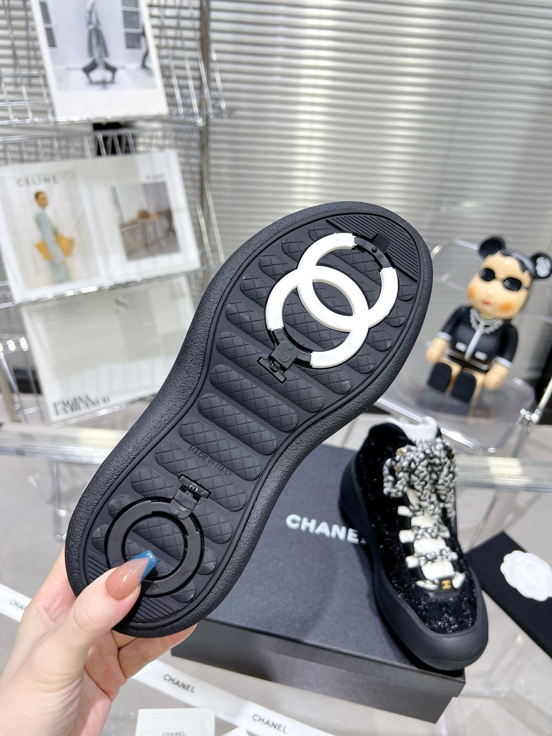 CHANEL CANO ALTO SNEAKER IN BLACK TWEED AND RUBBER