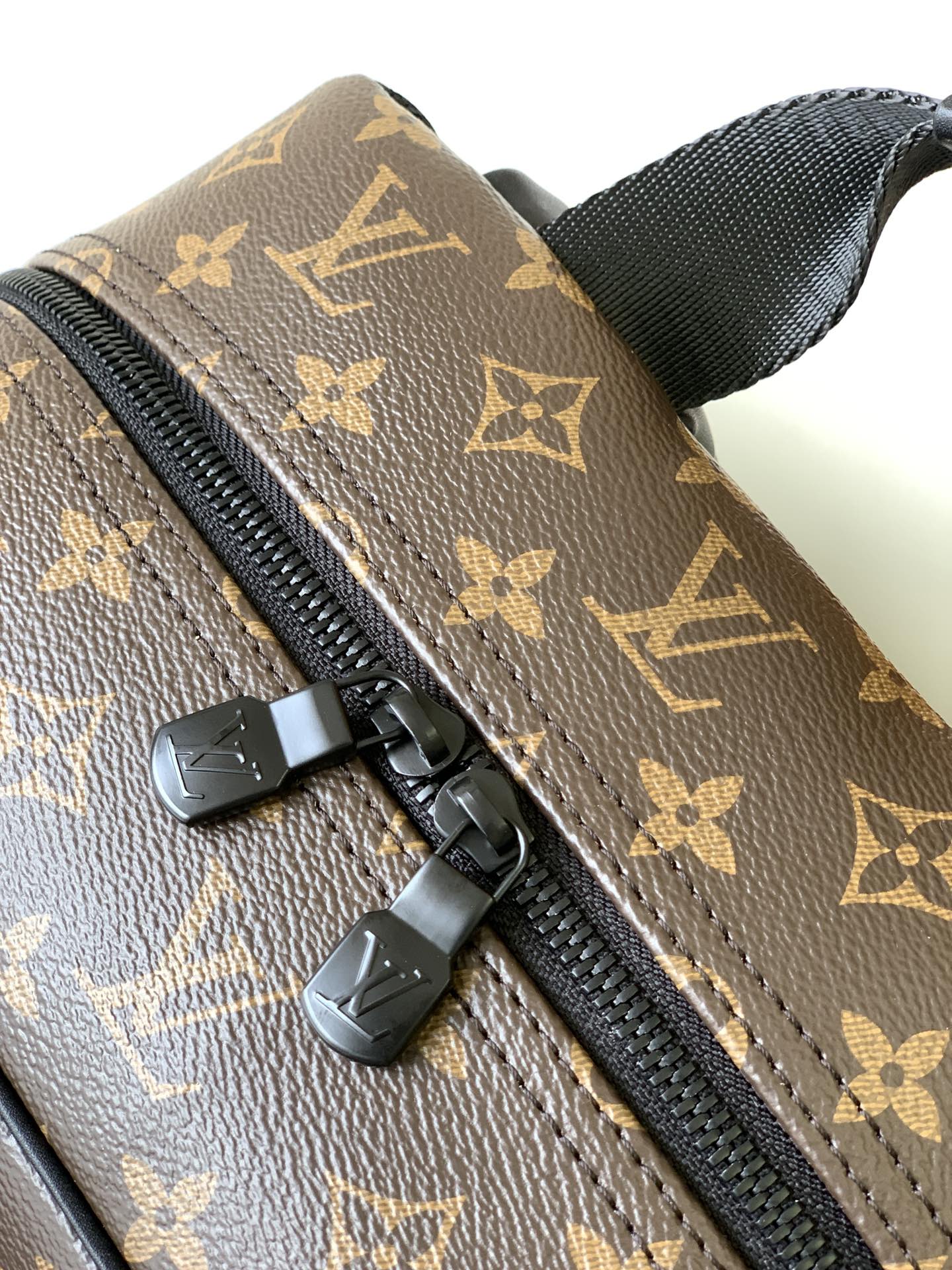 LOUIS VUITTON DEAN BACKPACK 42 IN BLACK AND BROWN MONOGRAM CANVAS