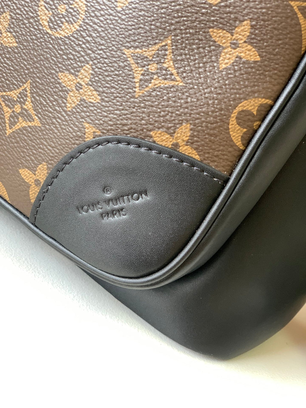 LOUIS VUITTON DEAN BACKPACK 42 IN BLACK AND BROWN MONOGRAM CANVAS