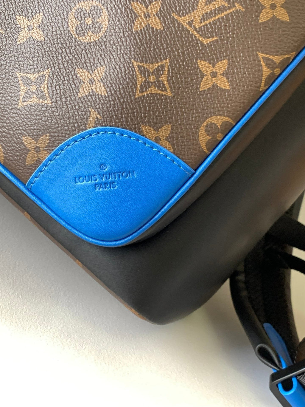LOUIS VUITTON DEAN BACKPACK 42 IN BLUE AND BROWN MONOGRAM CANVAS