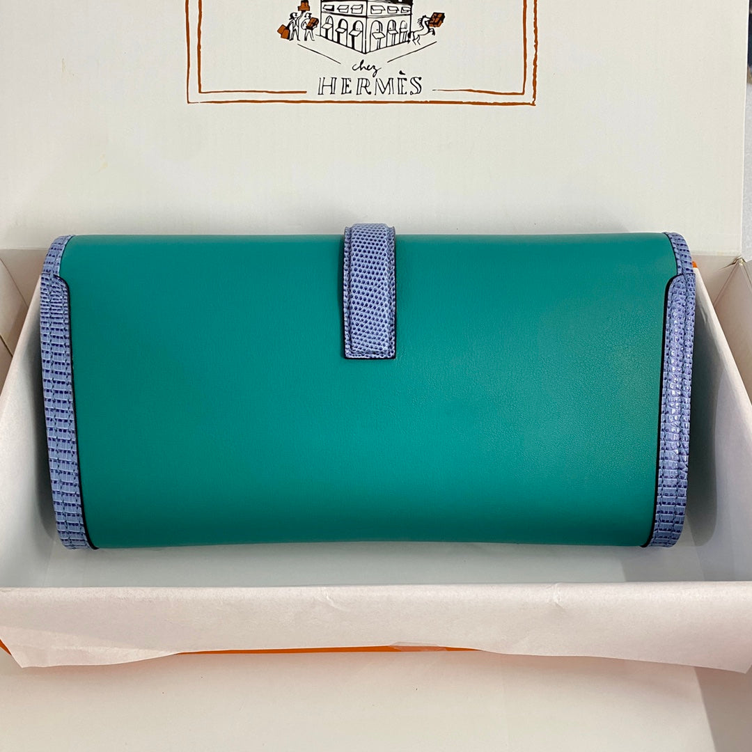 HERMES JIGE ELAN 29 CLUTCH IN TEAL GREEN CALFSKIN WITH ROYAL BLUE LIZARD SKIN