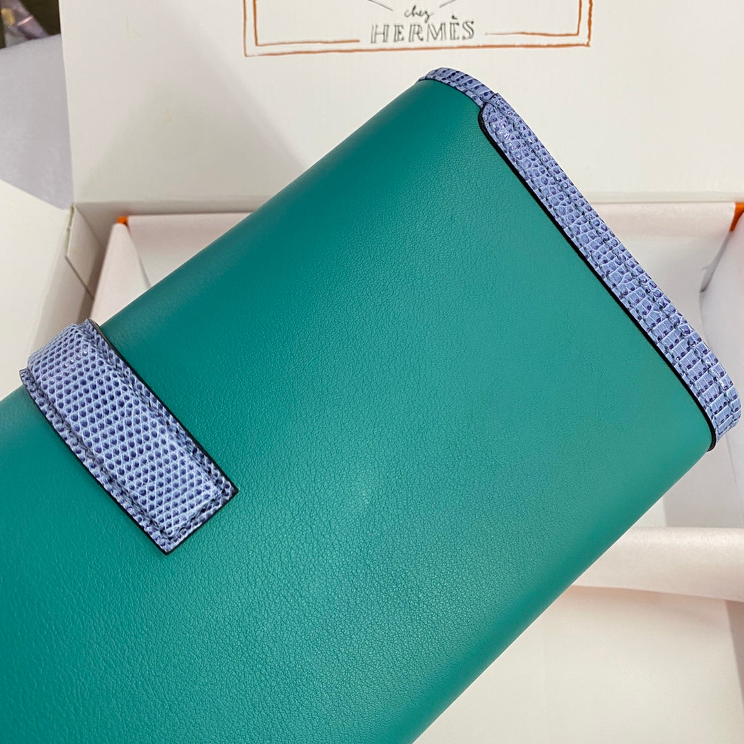 HERMES JIGE ELAN 29 CLUTCH IN TEAL GREEN CALFSKIN WITH ROYAL BLUE LIZARD SKIN