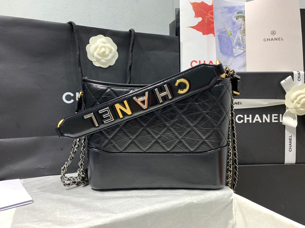 CHANEL HOBO BAG 25 WITH STRAP IN BLACK CALFSKIN GOLD AND SILVER HARDWARE