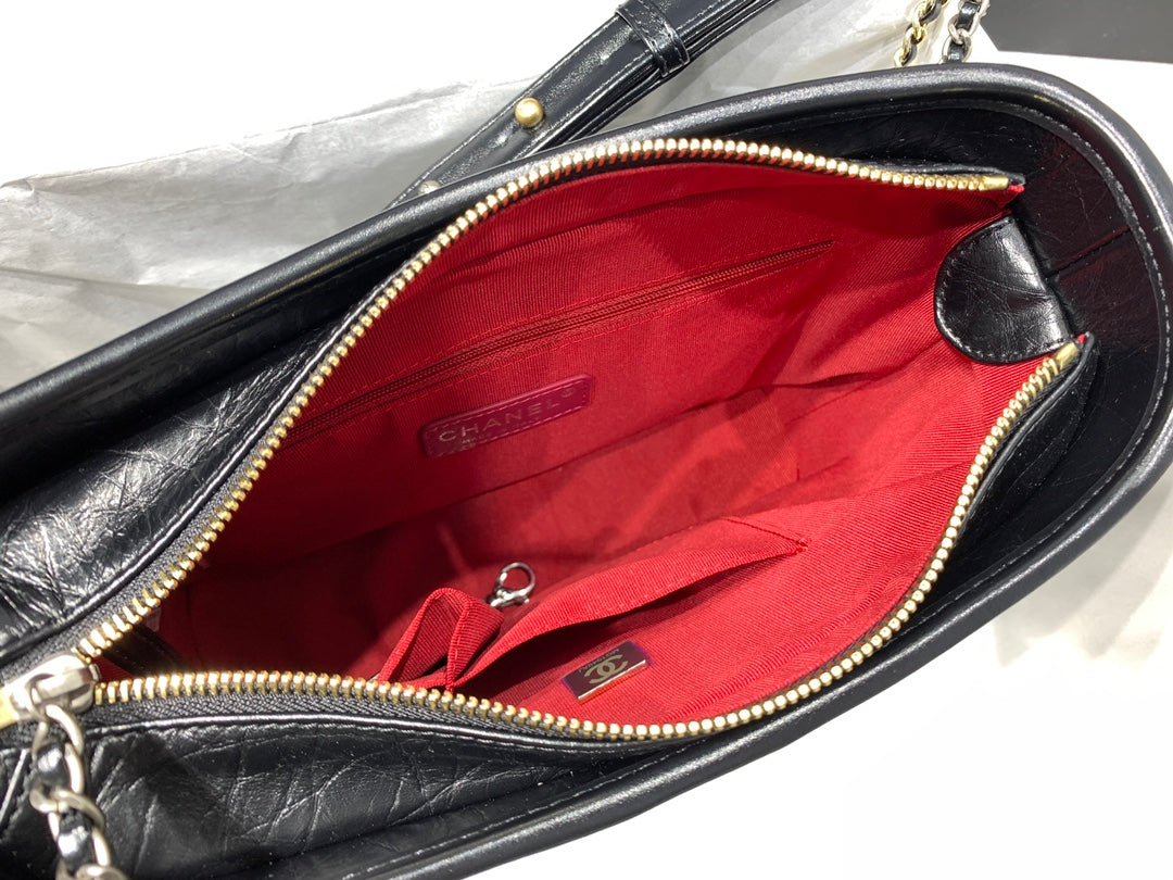 CHANEL HOBO BAG 25 WITH STRAP IN BLACK CALFSKIN GOLD AND SILVER HARDWARE