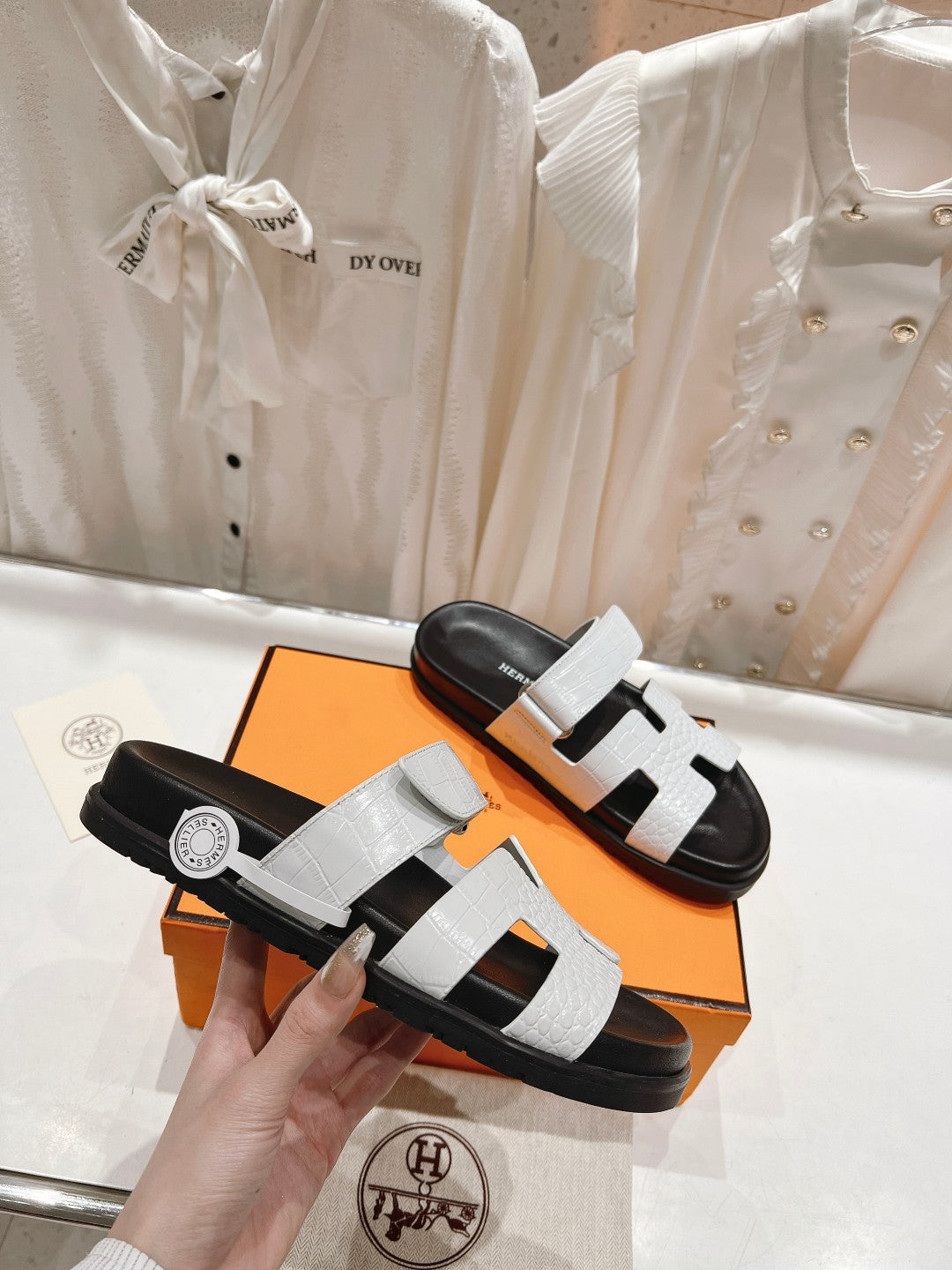 HERMES CHYPRE SANDAL BLACK AND WHITE LAMBSKIN