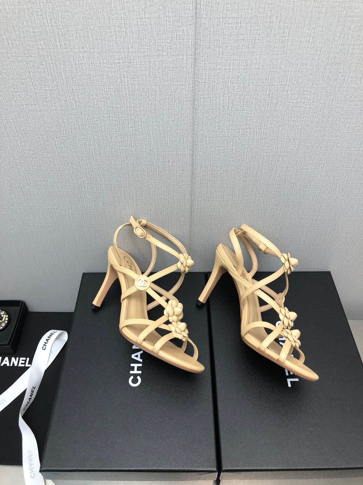 CHANEL FLORAL HIGH HEEL SANDAL IN SAND YELLOW LAMBSKIN