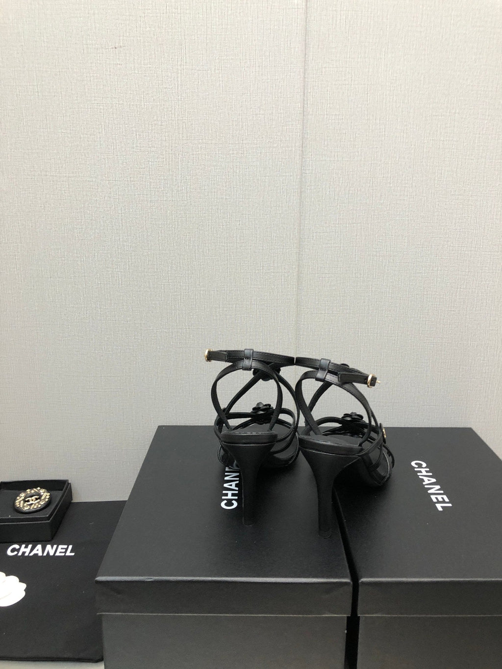CHANEL FLORAL HIGH HEEL SANDAL IN BLACK LAMBSKIN