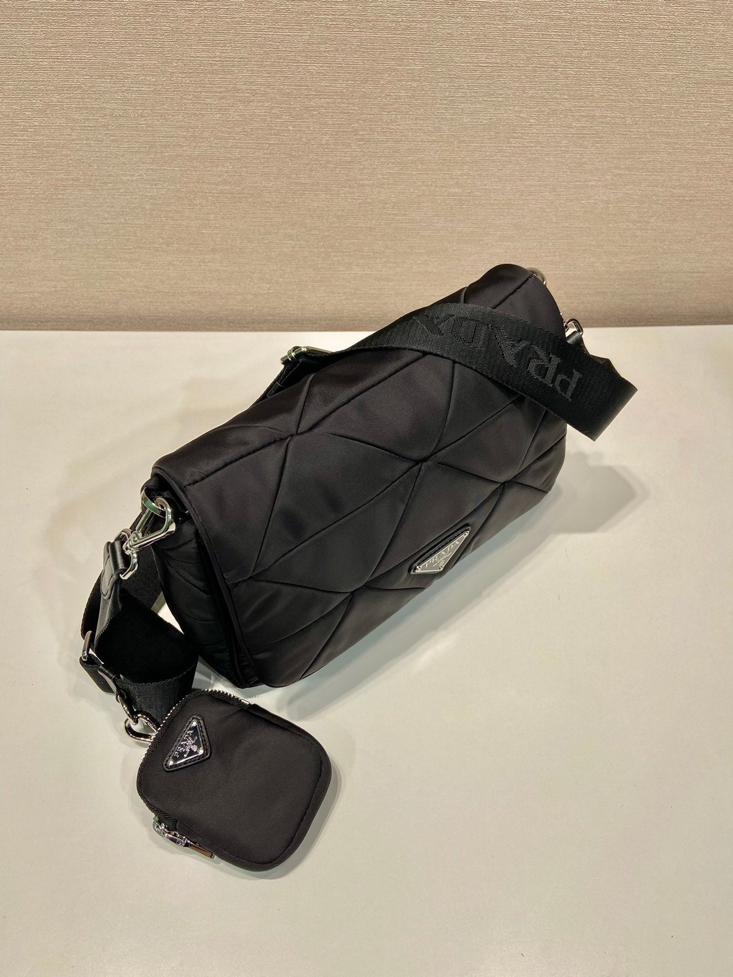 PRADA MEDIUM FLAP BAG 24 IN BLACK TRIANGULAR QUILTED PATTERN RE-NYLON