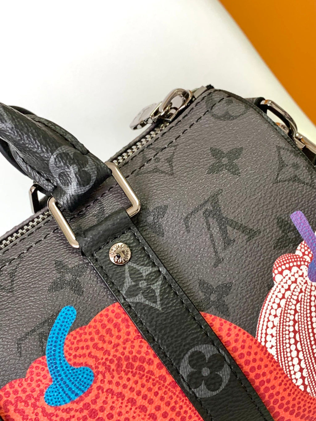 LOUIS VUITTON KEEPALL BANDOULIÈRE 21 IN MULTICOLOR CALFSKIN
