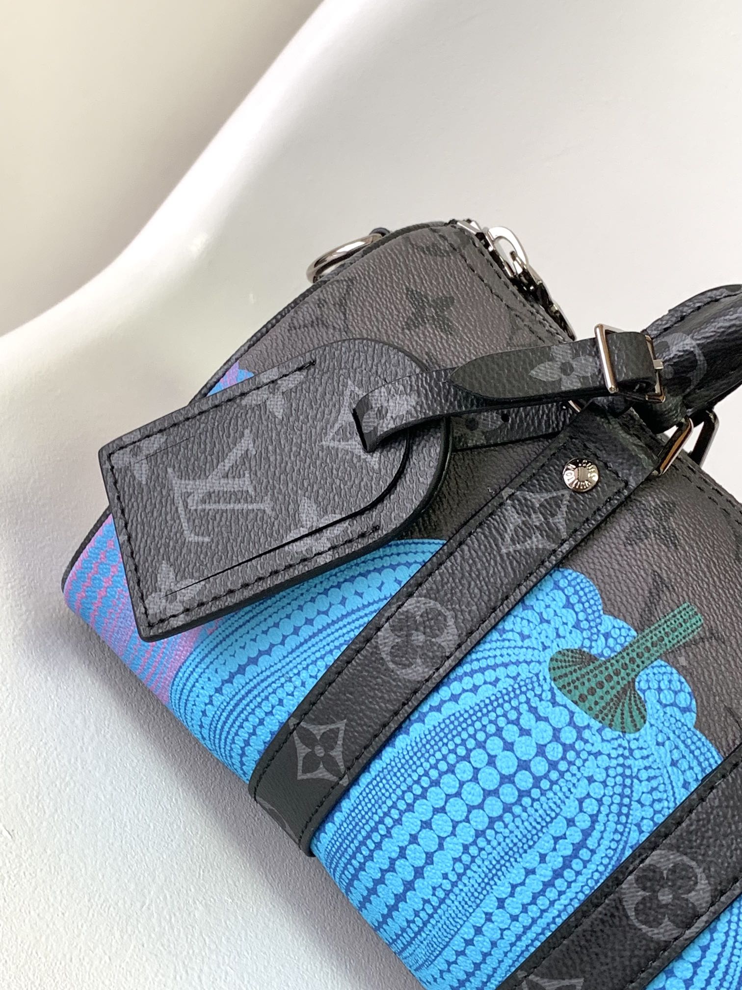 LOUIS VUITTON KEEPALL BANDOULIÈRE 21 IN MULTICOLOR CALFSKIN