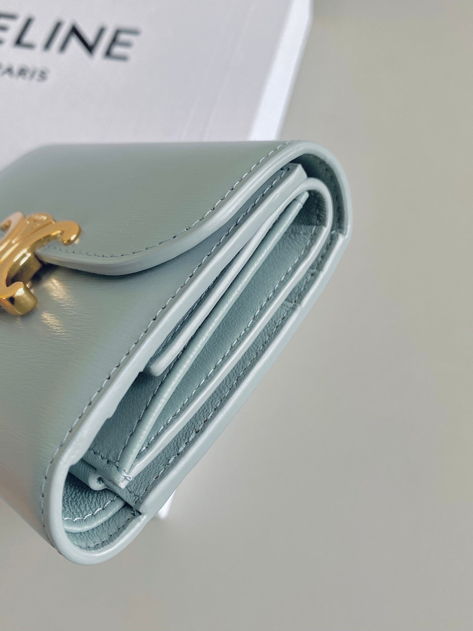 CELINE TRIPHOME 10 TRIFOLD WALLET CALFSKIN BLUE PASTEL