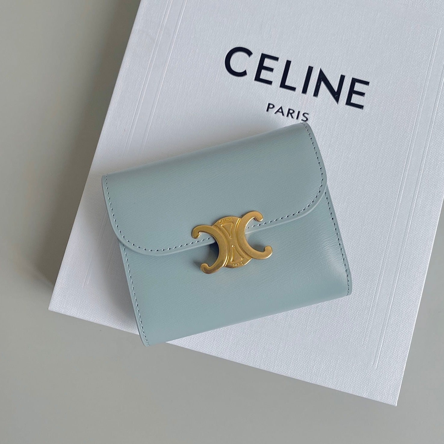CELINE TRIPHOME 10 TRIFOLD WALLET CALFSKIN BLUE PASTEL