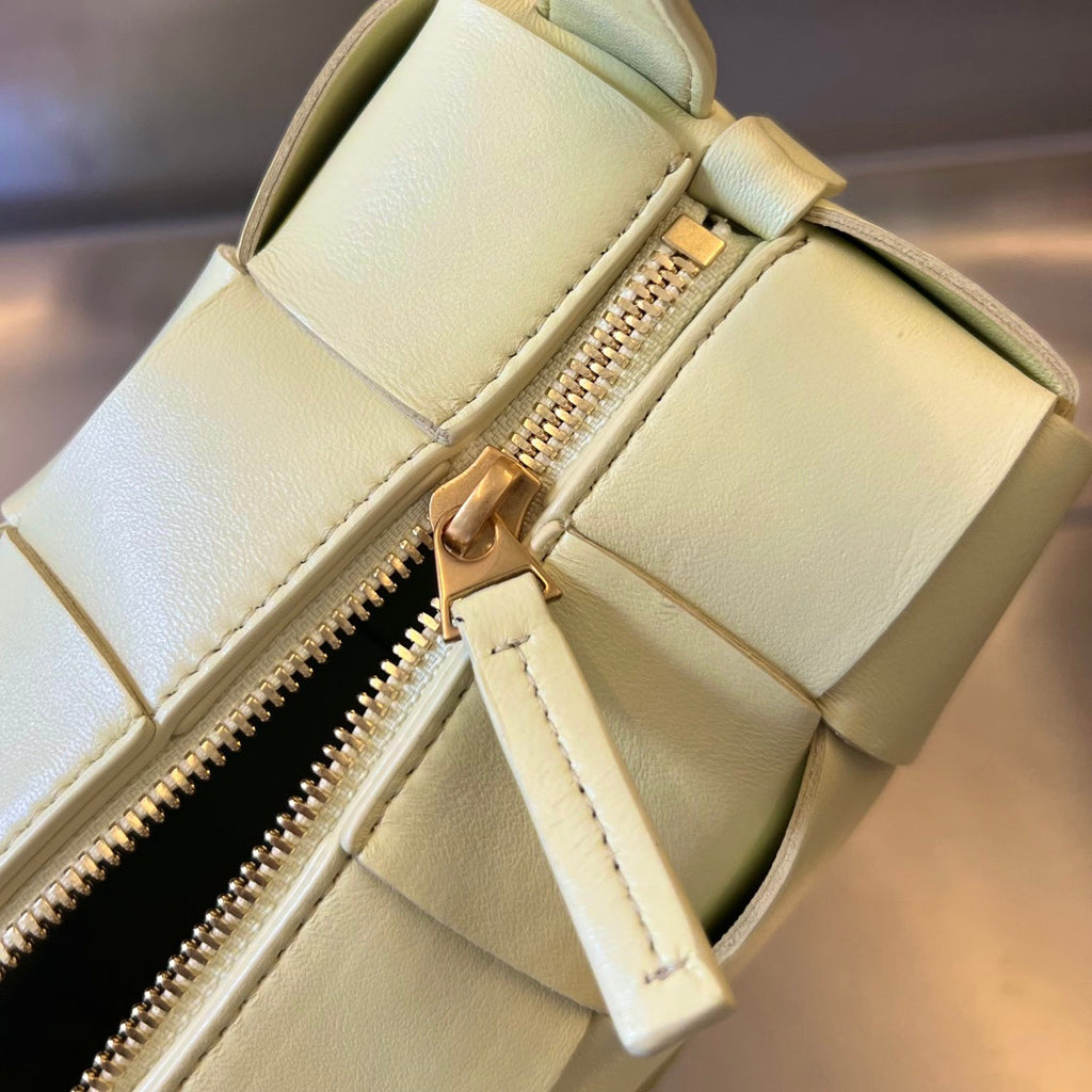 BOTTEGA VENETA BRICK CASSETTE 28 IN PASTEL YELLOW CALFSKIN