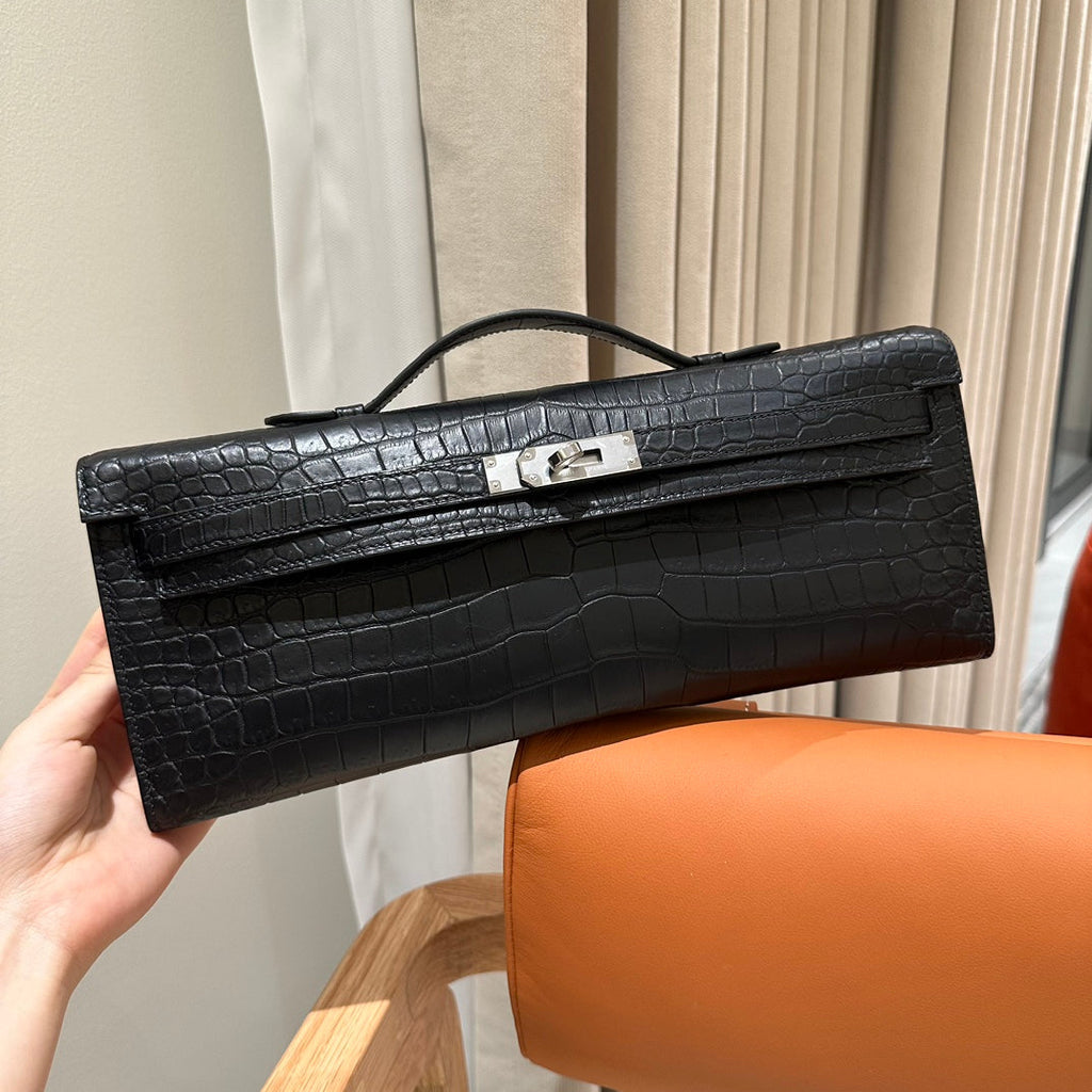 HERMES KELLY CUT 31 IN BLACK SHINY ALLIGATOR LEATHER WITH SILVER HARDWARE