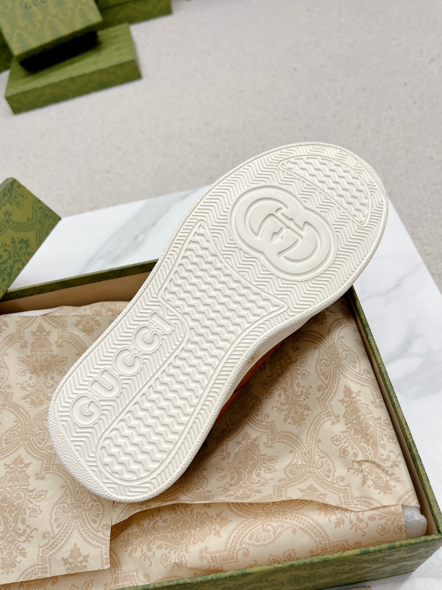 GUCCI EMBOSSED TRAINER CARAMEL CALFSKIN