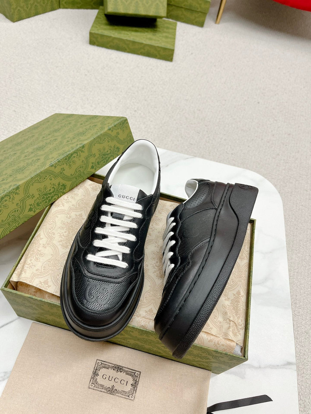 GUCCI EMBOSSED TRAINER BLACK CALFSKIN