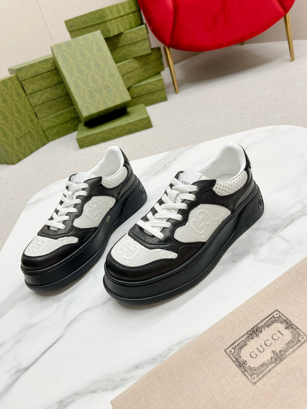 GUCCI EMBOSSED TRAINER BLACK AND WHITE CALFSKIN