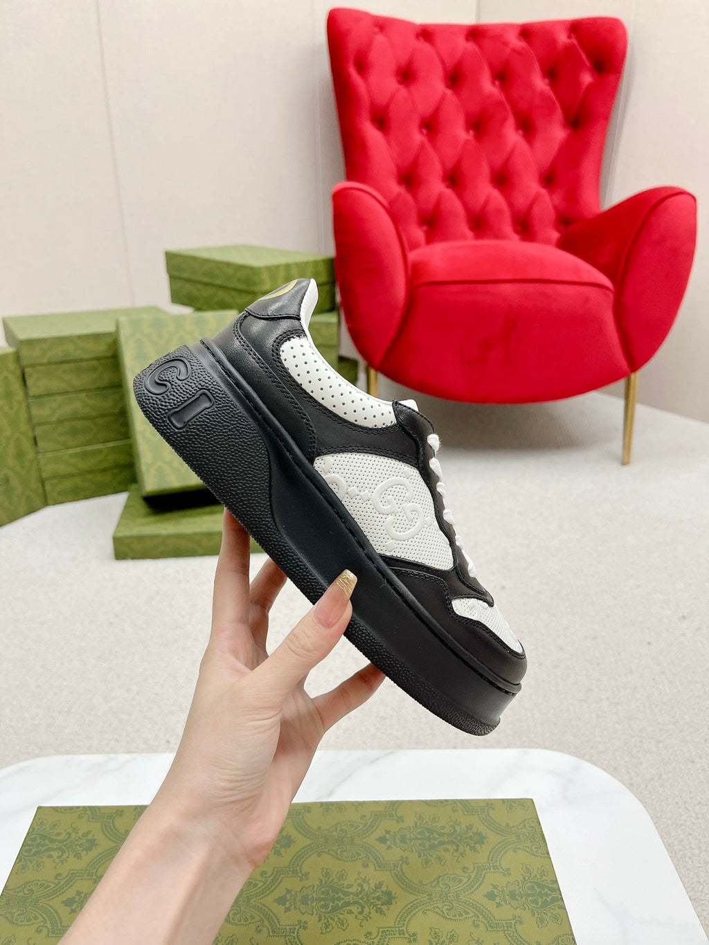 GUCCI EMBOSSED TRAINER BLACK AND WHITE CALFSKIN