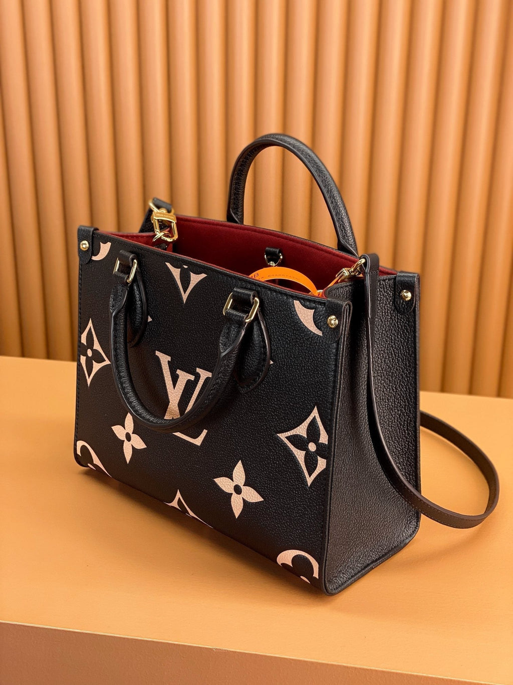 LOUIS VUITTON ONTHEGO TOTE 25 IN BLACK AND CREAM MONOGRAM EMPREINTE