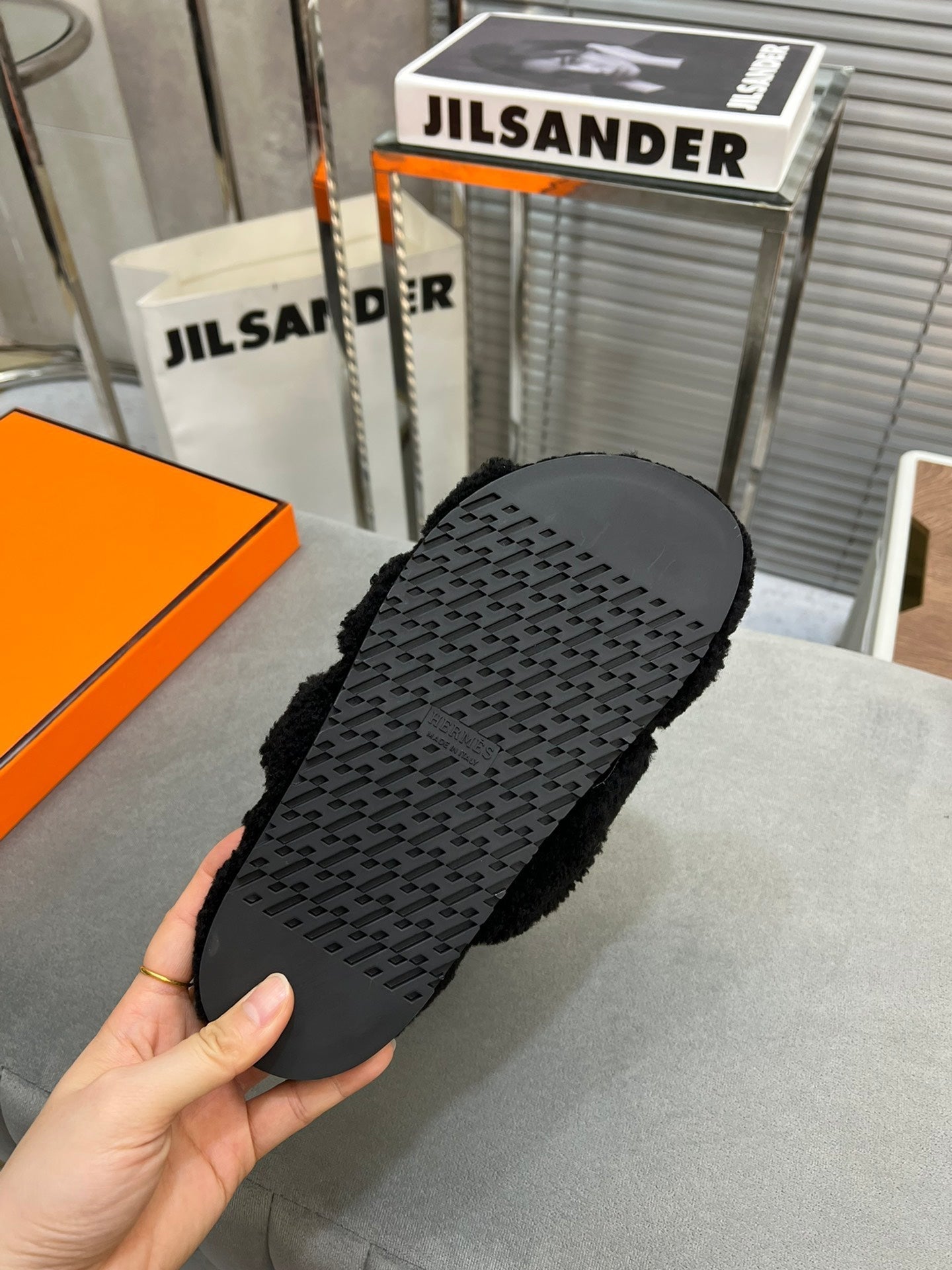 HERMES CHYPRE SLIPPERS IN BLACK LAMB WOOL