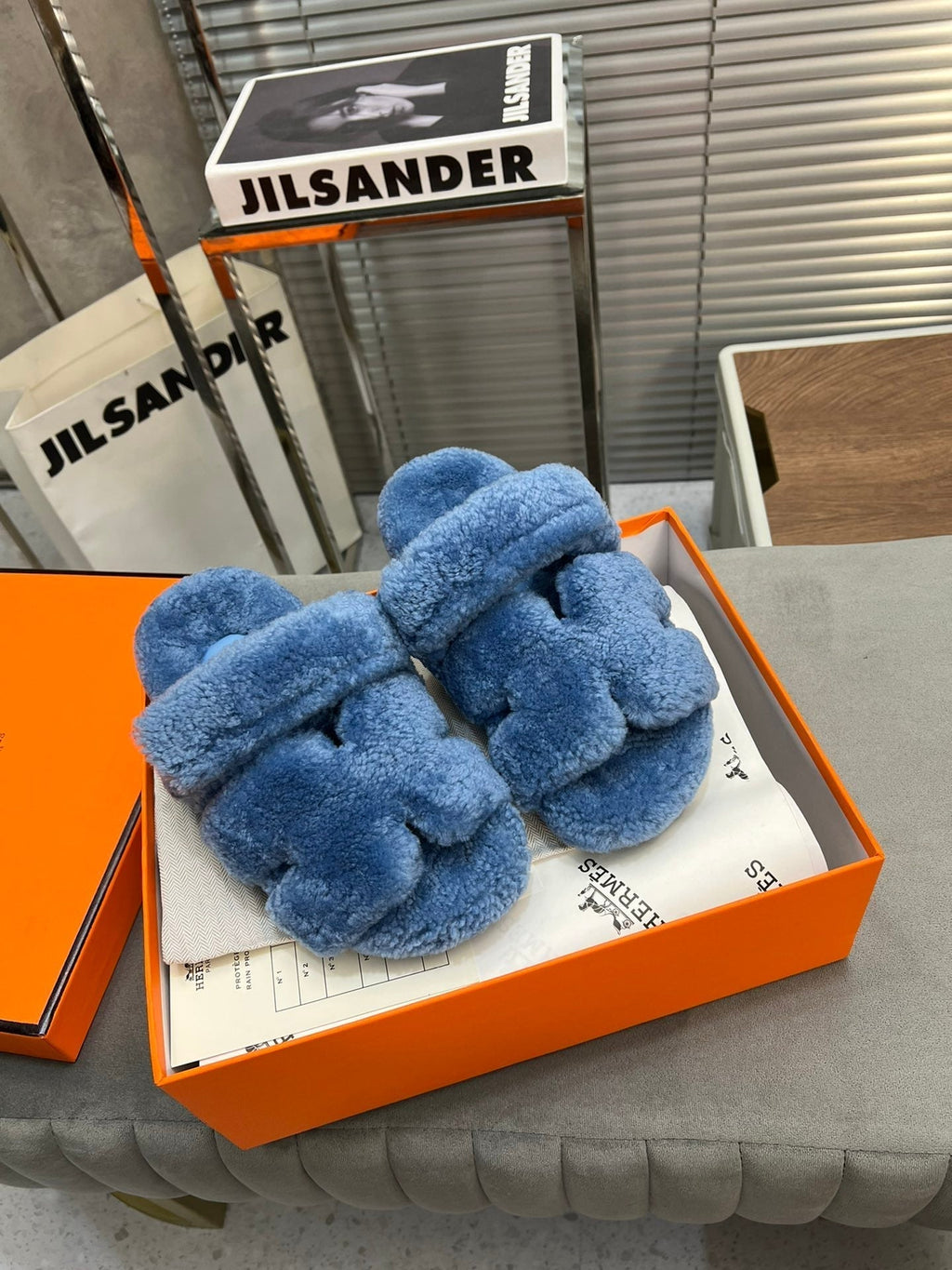 HERMES CHYPRE SLIPPERS IN AZURE BLUE LAMB WOOL
