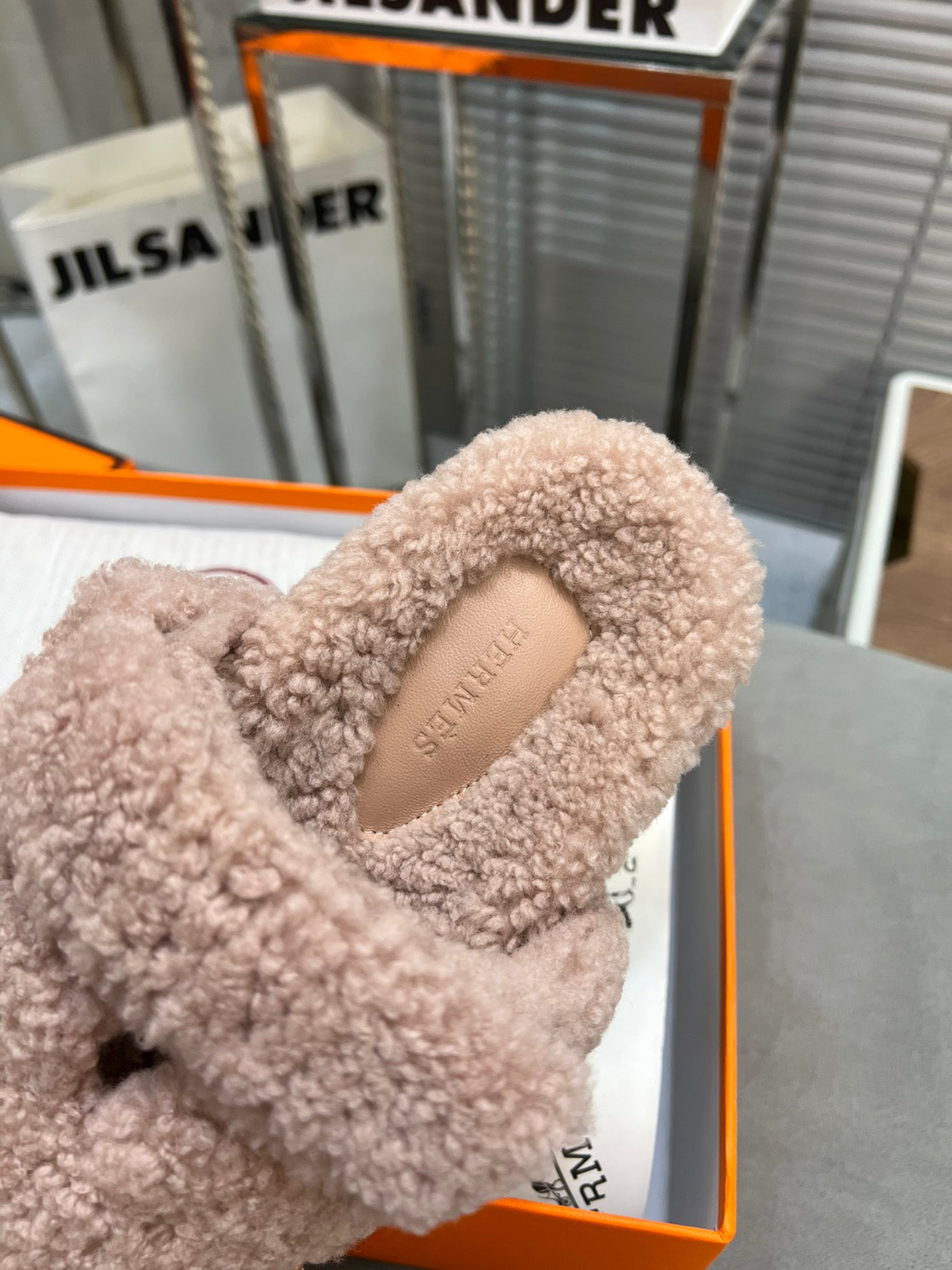 HERMES CHYPRE SLIPPERS IN ROSY BROWN LAMB WOOL