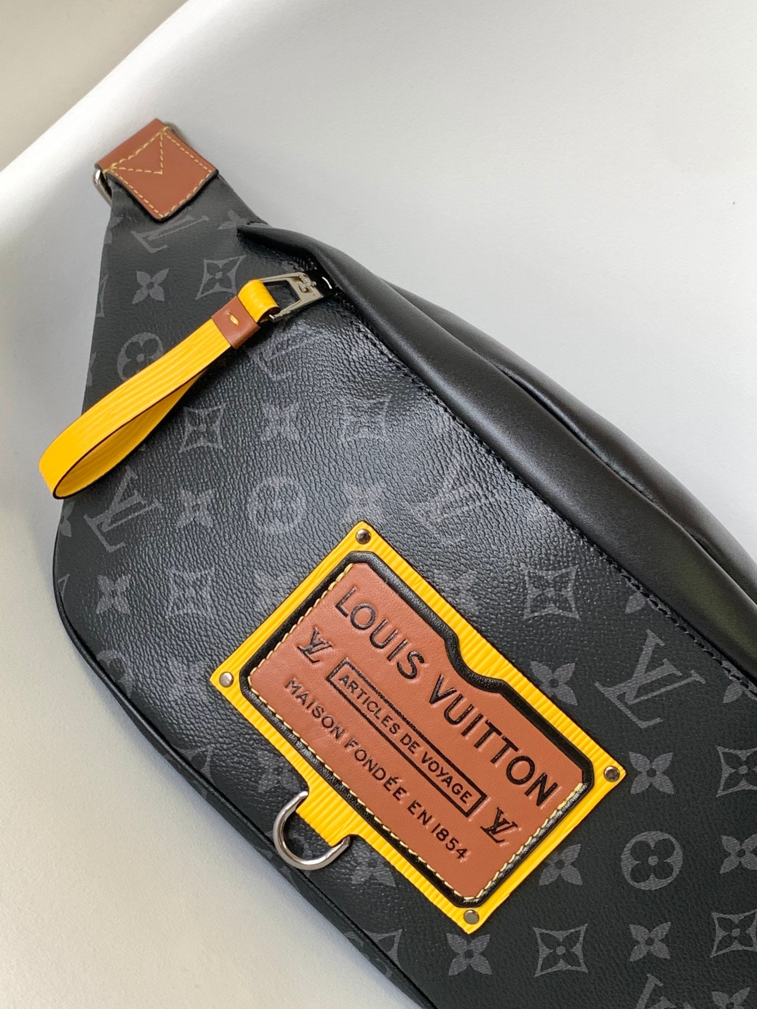 LOUIS VUITTON LV 25S BUMBAG 37 IN BLACK AND YELLOW COATED MONOGRAM CALFSKIN