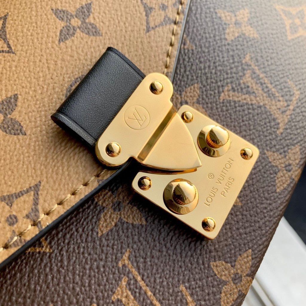LOUIS VUITTON POCHETTE MÉTIS EAST WEST 21.5 IN BROWN MONOGRAM COATED CANVAS AND CALFSKIN