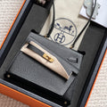 HERMES KELLY DESORDRE 20 IN BLACK EPSOM LEATHER WITH GOLD HARDWARE