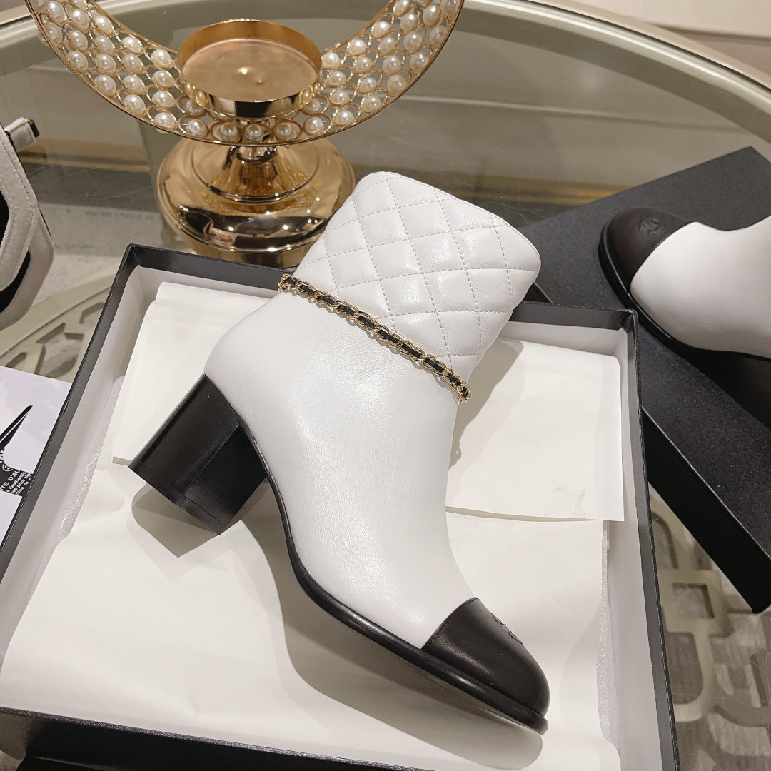 CHANEL MID-HEEL ANKLE BOOTS IN WHITE CALFSKIN