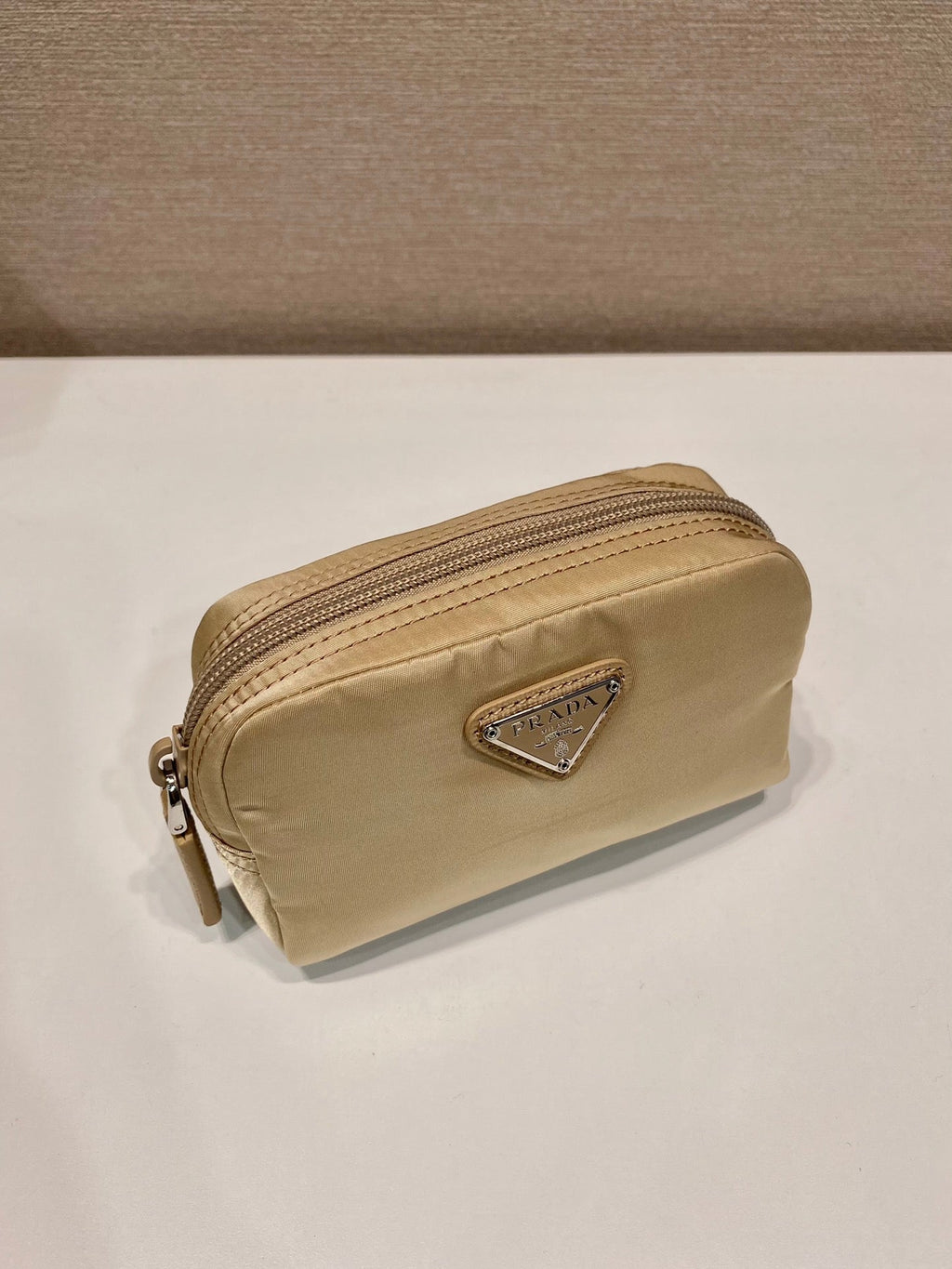 PRADA CLUTCH 12 IN TAN BROWN RE-NYLON