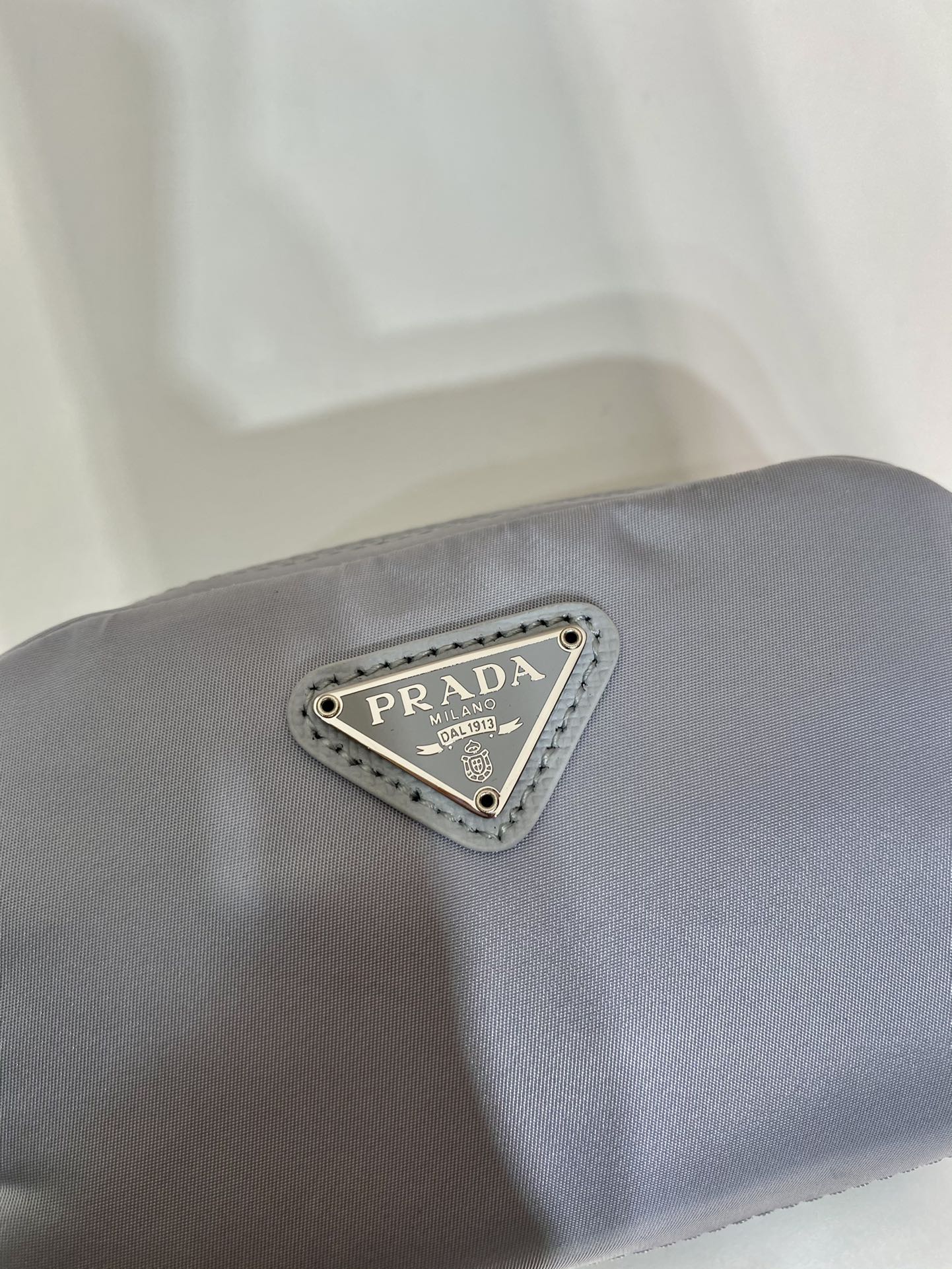 PRADA CLUTCH 12 IN LIGHT GREY RE-NYLON