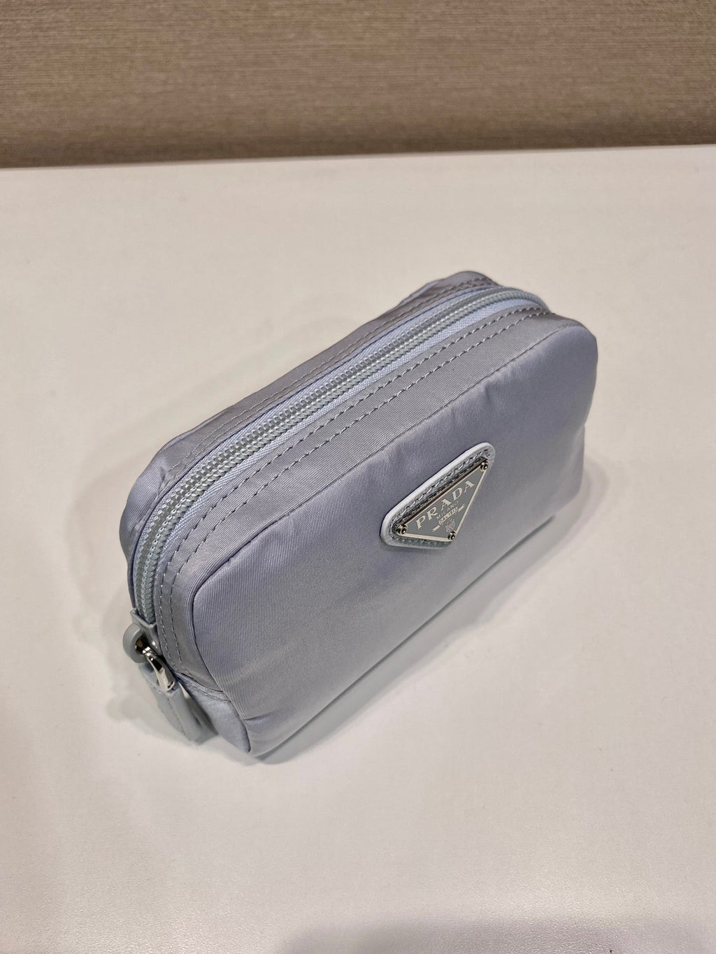 PRADA CLUTCH 12 IN LIGHT GREY RE-NYLON