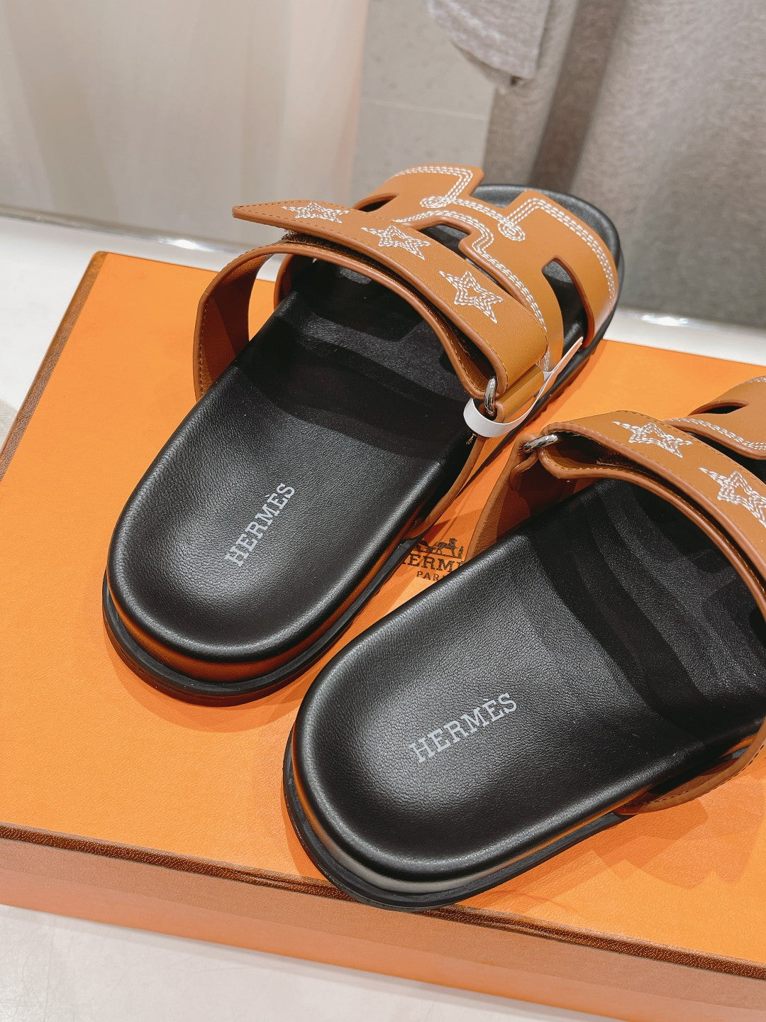 HERMES STAR-PATTERNED SANDAL BLACK AND CARAMEL CALFSKIN