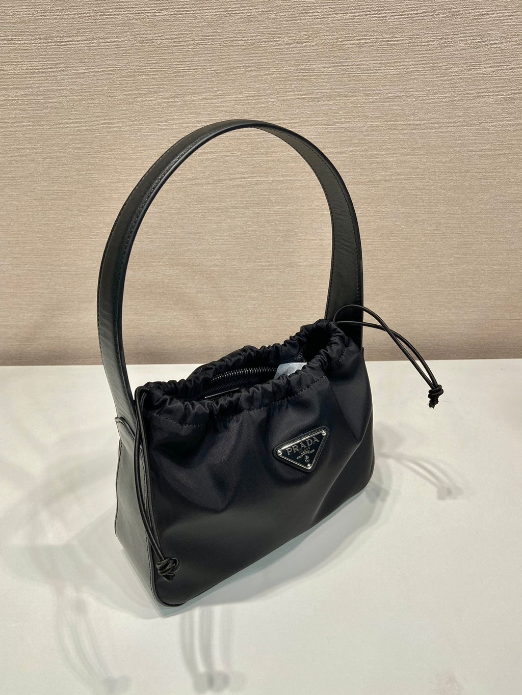 PRADA SMALL DRAWSTRING BAG 23 IN BLACK RE-NYLON