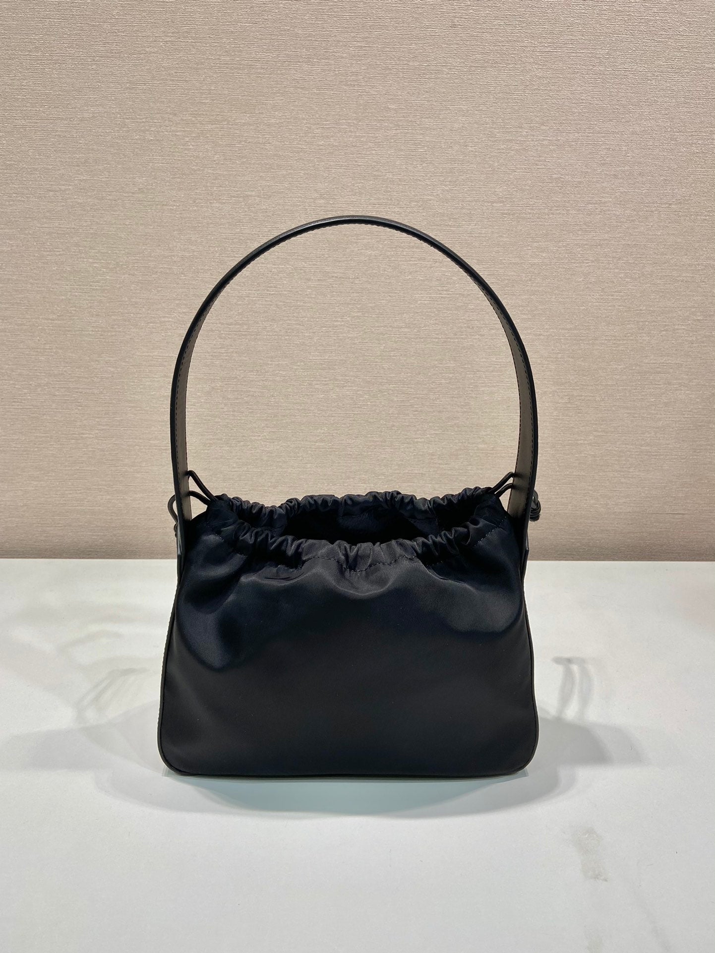PRADA SMALL DRAWSTRING BAG 23 IN BLACK RE-NYLON