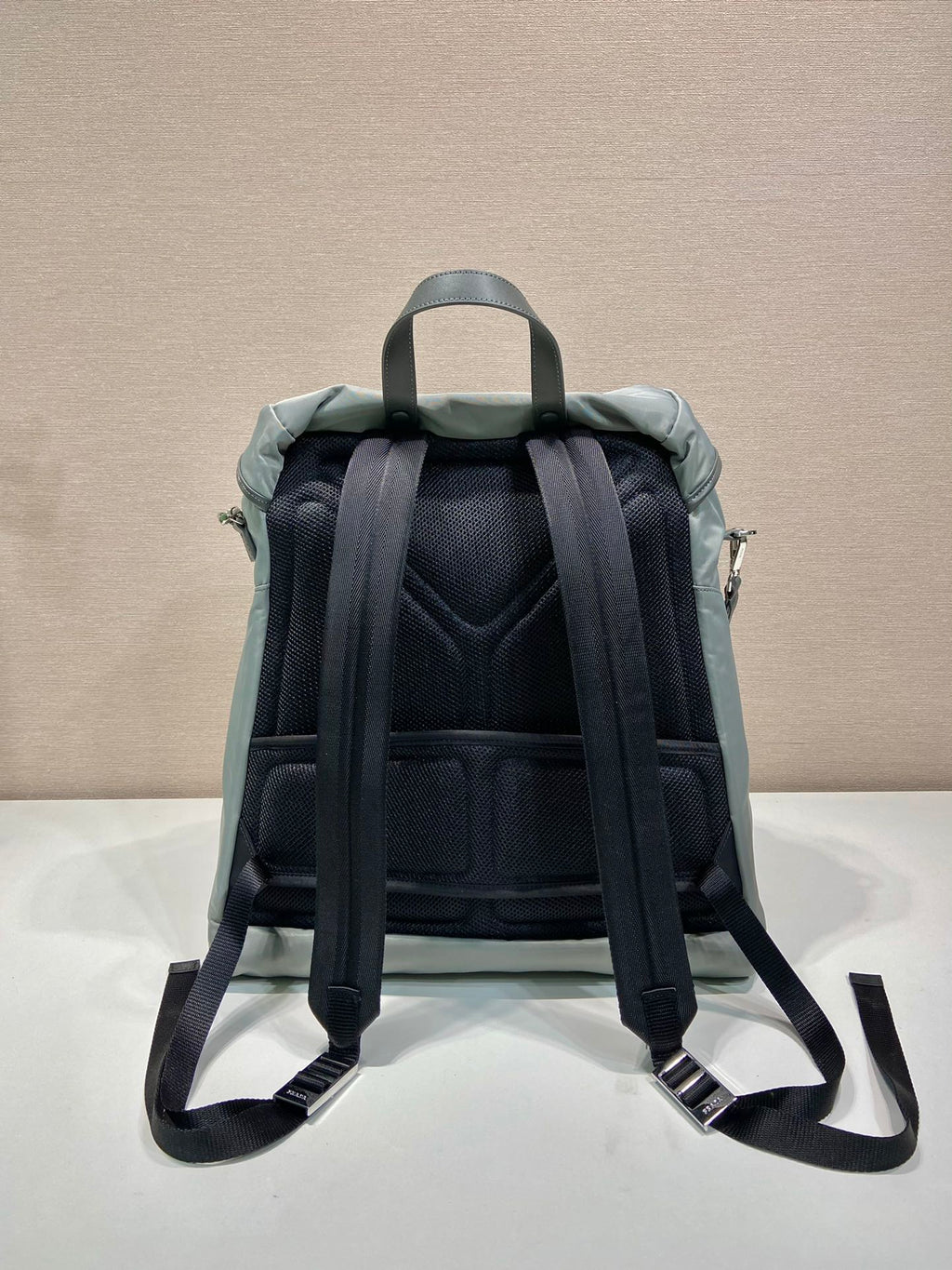 PRADA TRIANGLE LOGO BACKPACK 45 IN ASH GRAY RE-NYLON