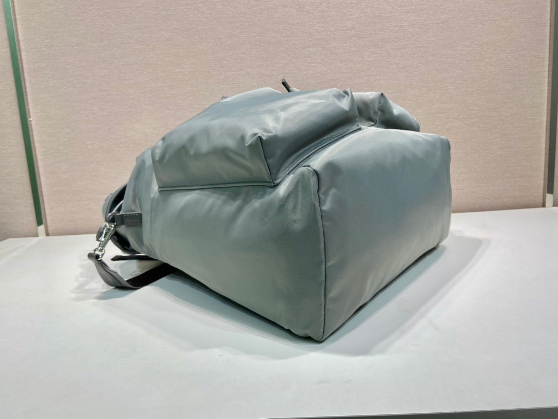 PRADA TRIANGLE LOGO BACKPACK 45 IN ASH GRAY RE-NYLON