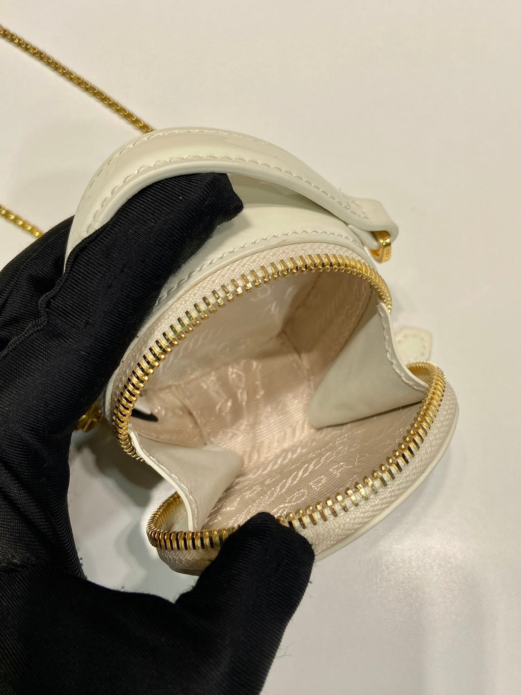 PRADA MINI ROUND BAG 8 IN WHITE GLOSSY CALFSKIN GOLD HARDWARE