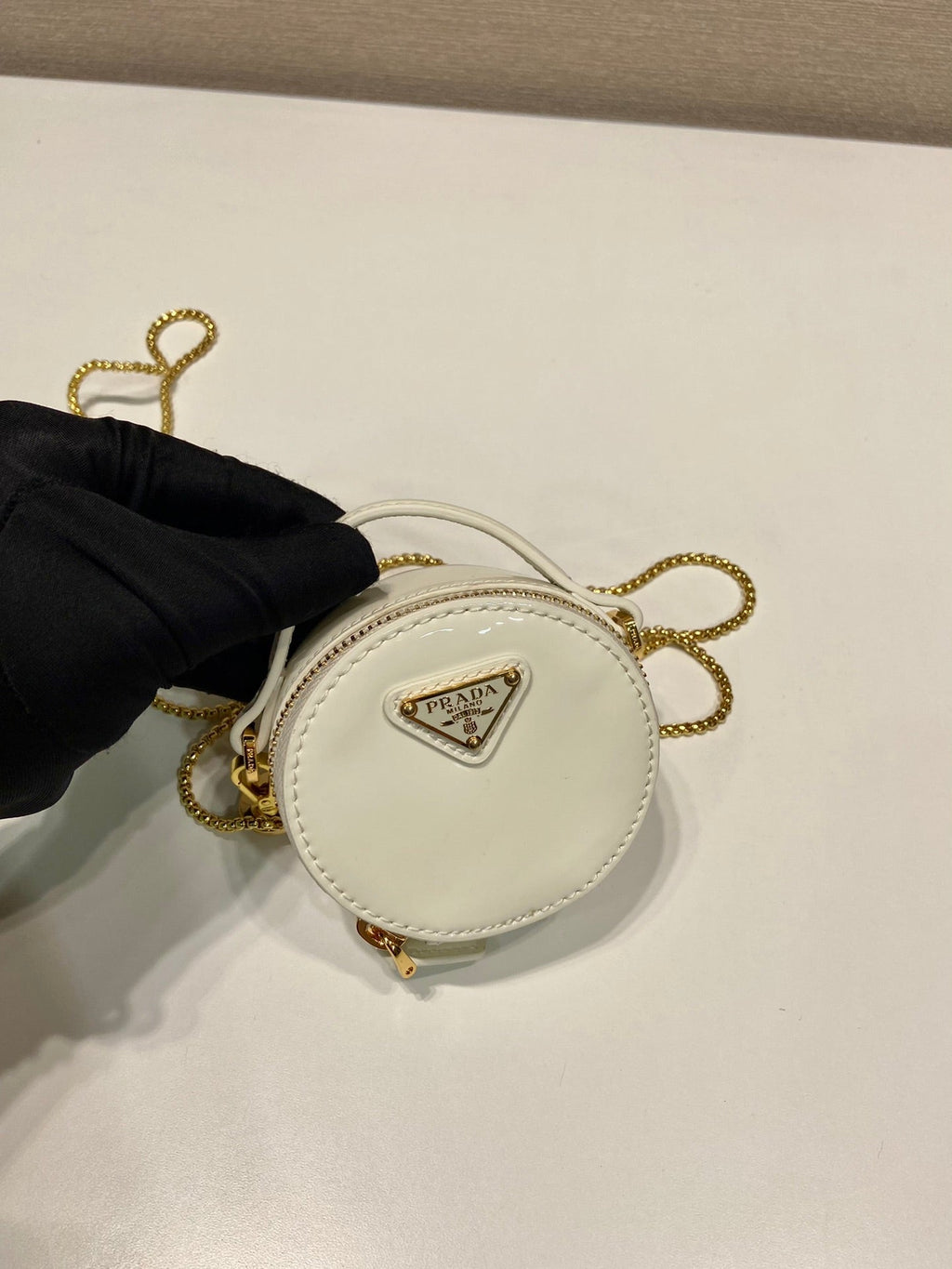 PRADA MINI ROUND BAG 8 IN WHITE GLOSSY CALFSKIN GOLD HARDWARE