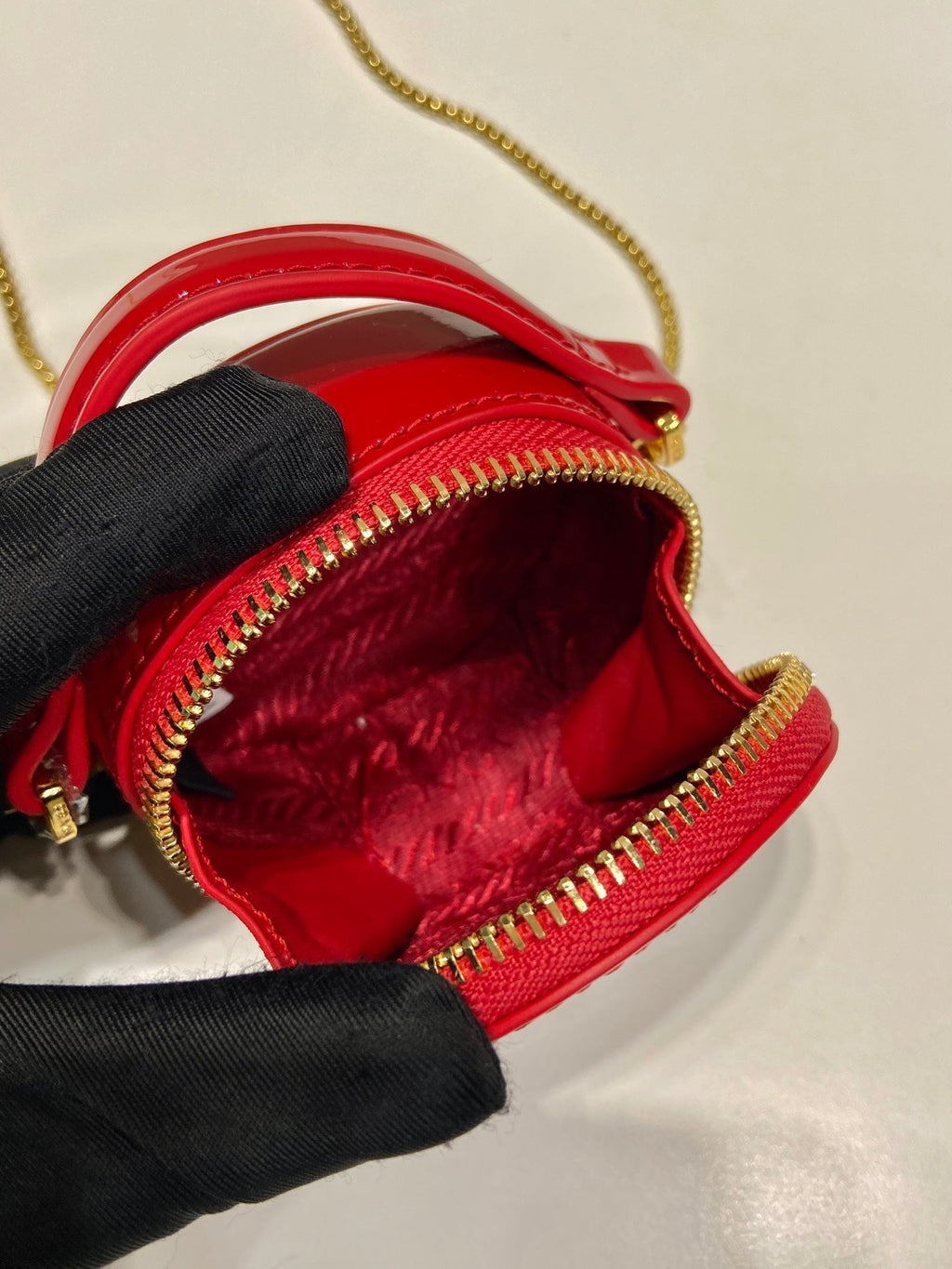 PRADA MINI ROUND BAG 8 IN RED GLOSSY CALFSKIN GOLD HARDWARE