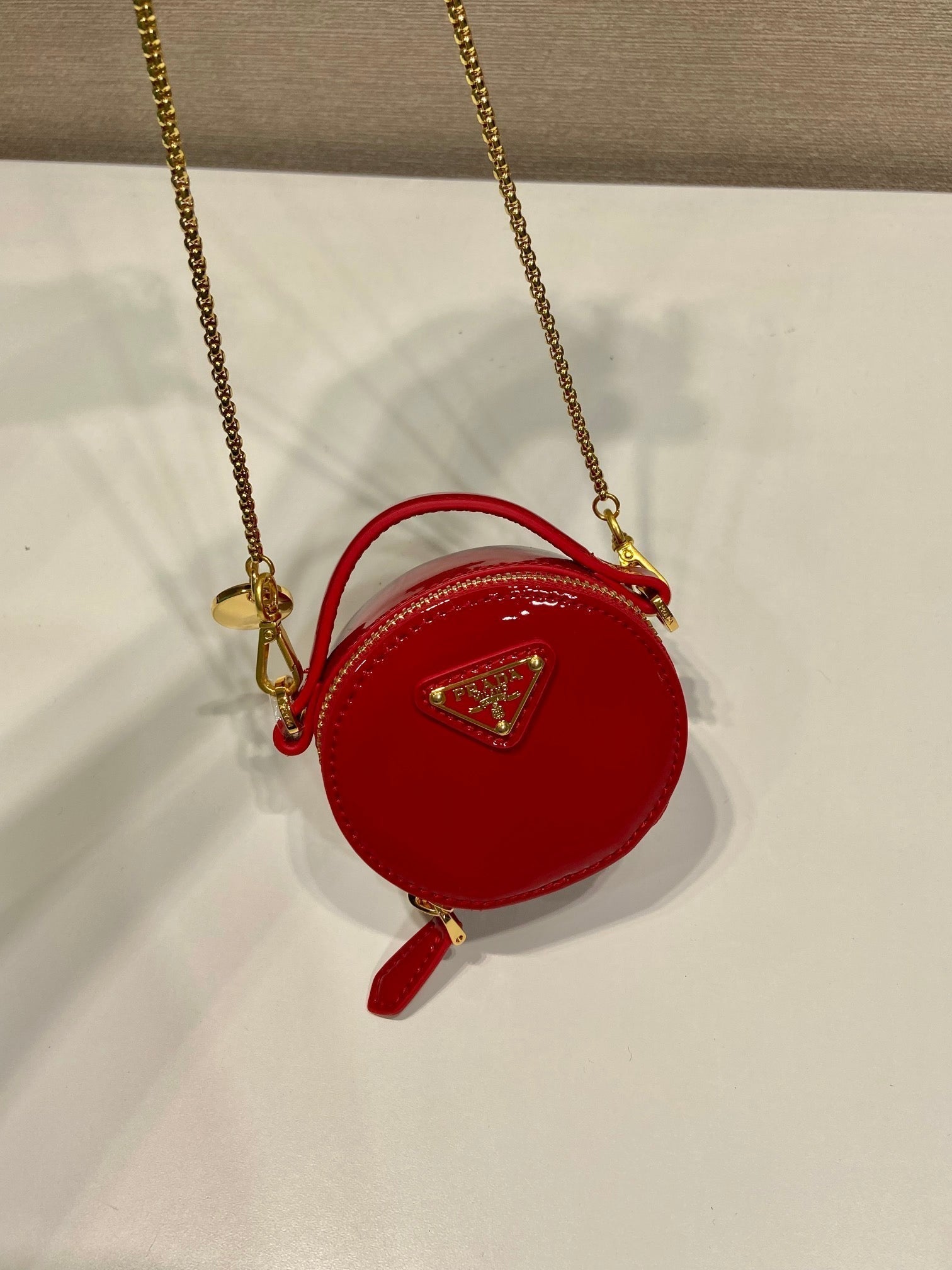 PRADA MINI ROUND BAG 8 IN RED GLOSSY CALFSKIN GOLD HARDWARE