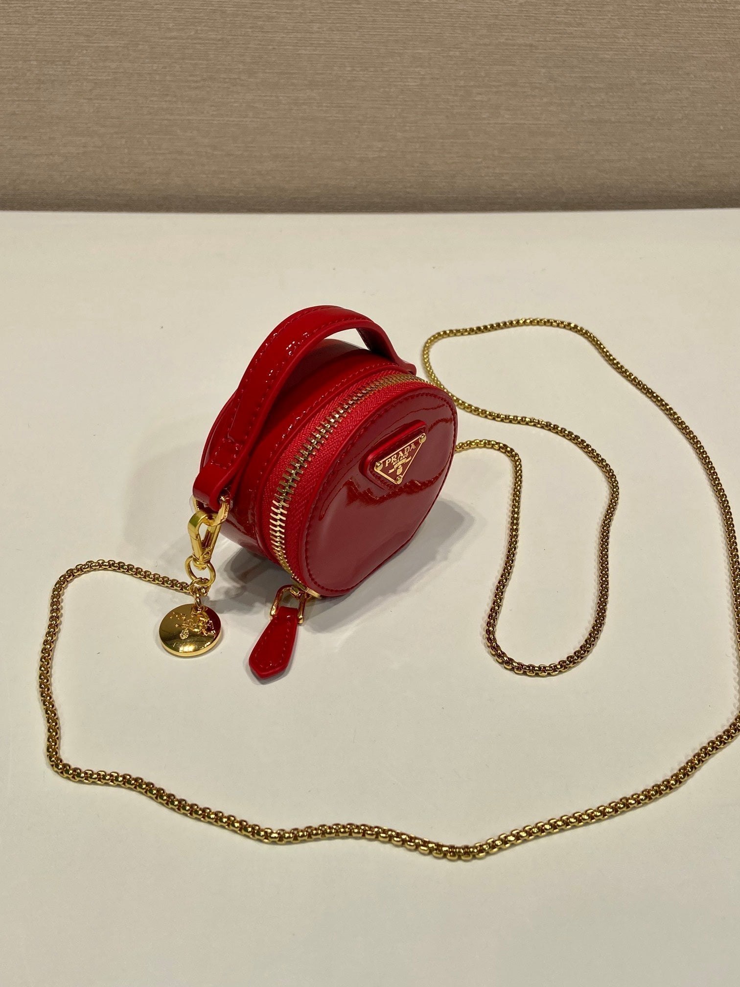 PRADA MINI ROUND BAG 8 IN RED GLOSSY CALFSKIN GOLD HARDWARE