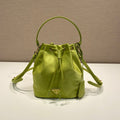 PRADA BUCKET BAG 19 IN APPLE GREEN RE-NYLON AND SAFFIANO LEATHER HANDLE