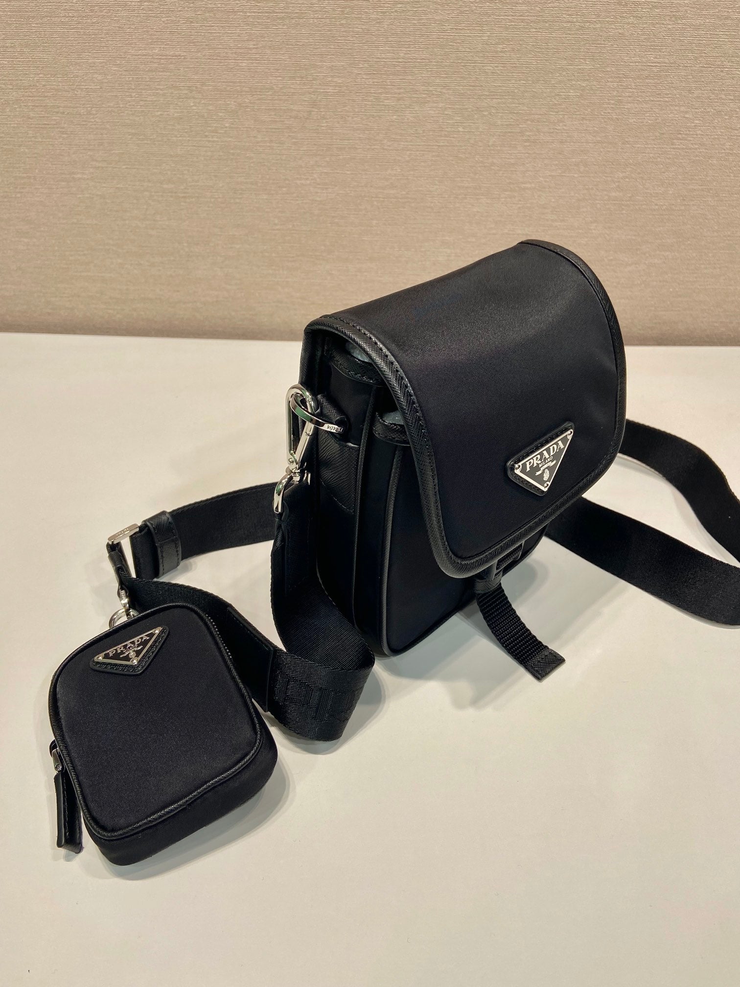 PRADA PHONE BAG 19 IN BLACK RE-NYLON AND SAFFIANO LEATHER TRIM