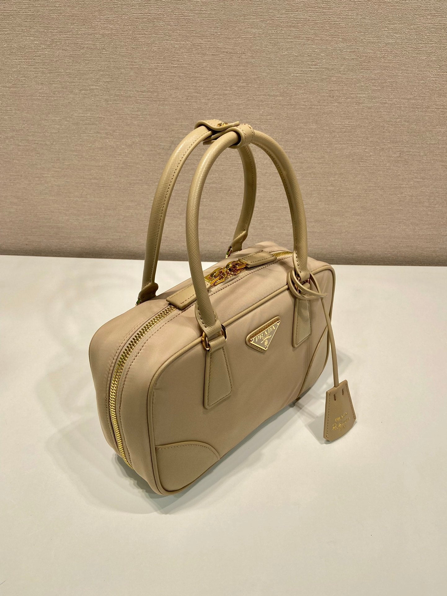 PRADA SMALL TOP HANDLE BAG 25 IN DRIED MOSS NYLON AND CALFSKIN TRIM