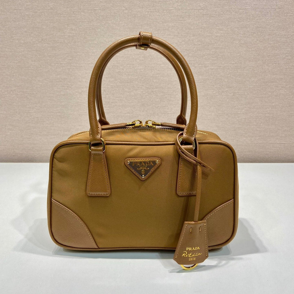 PRADA SMALL TOP HANDLE BAG 25 IN GOLDEN BROWN NYLON AND CALFSKIN TRIM