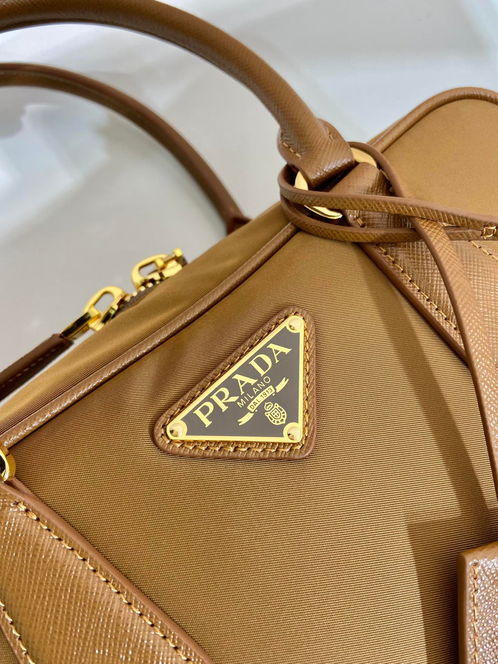 PRADA SMALL TOP HANDLE BAG 25 IN GOLDEN BROWN NYLON AND CALFSKIN TRIM